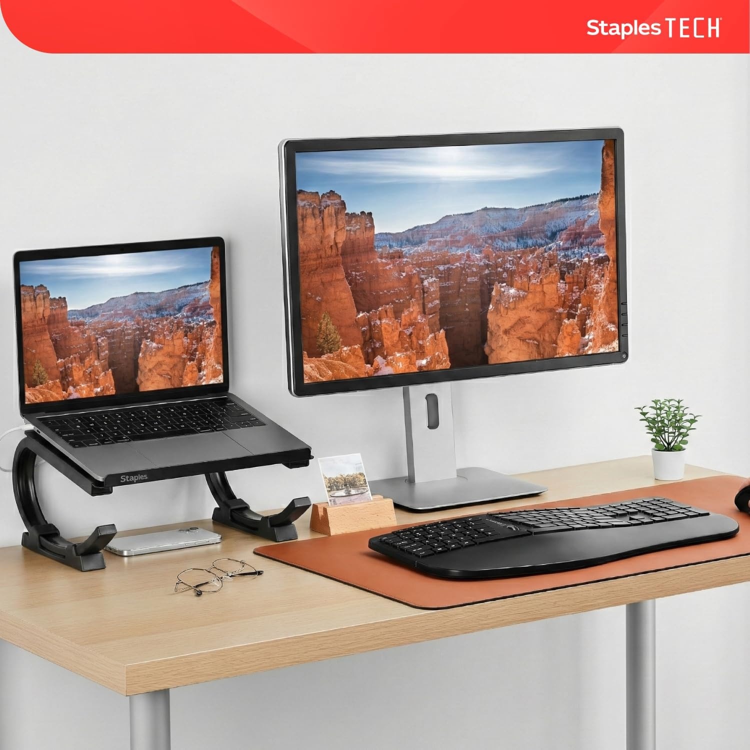 image:imageSTAPLES Adjustable Steel Laptop Stand Ergonomic Curved Desktop Riser for Laptops amp Notebooks